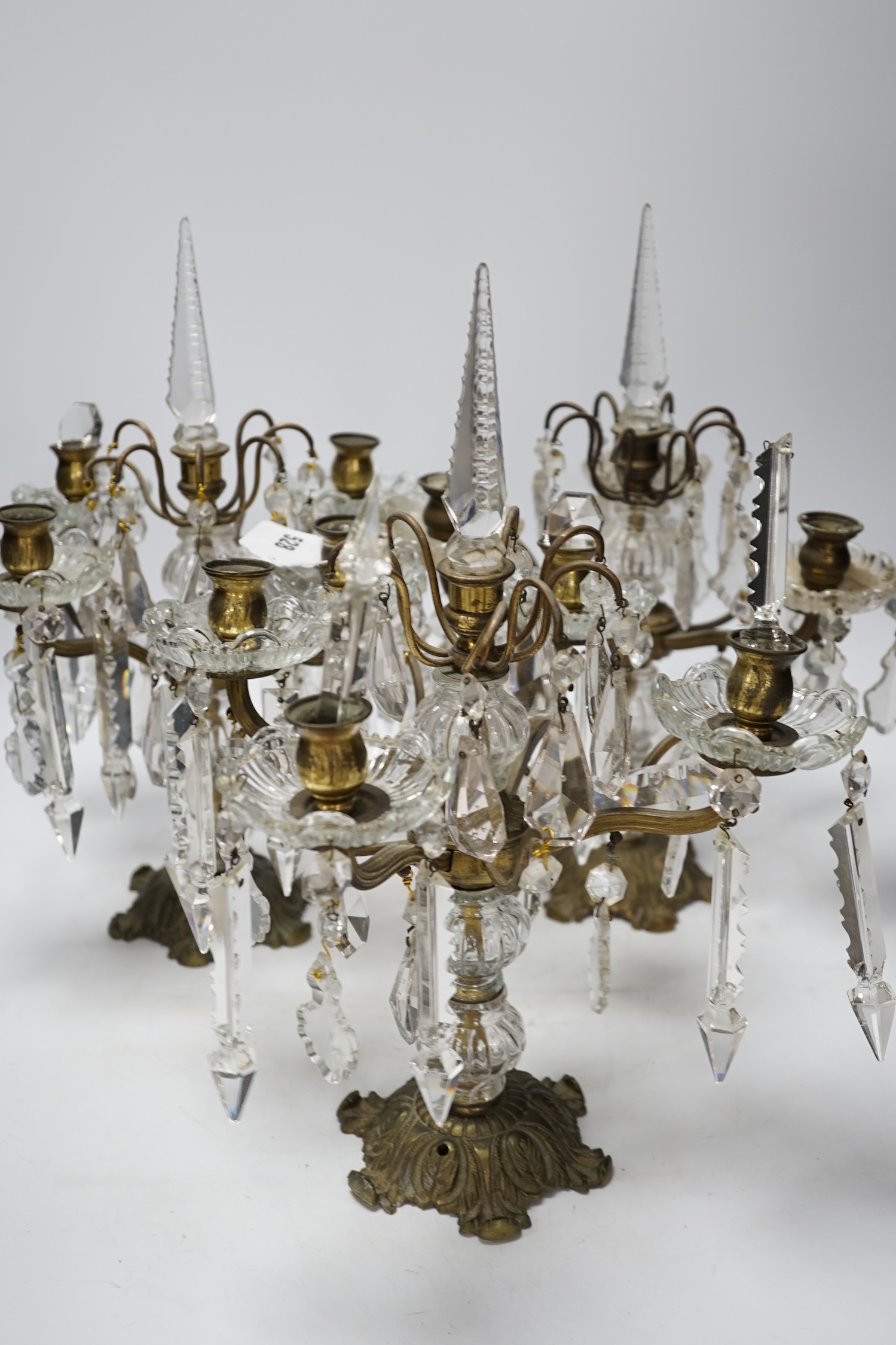 Three table lustre four branch candelabra, possibly French, 38cm high